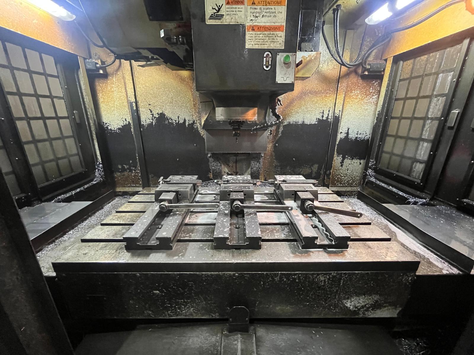 CNC vertical machining centre interior with workpieces